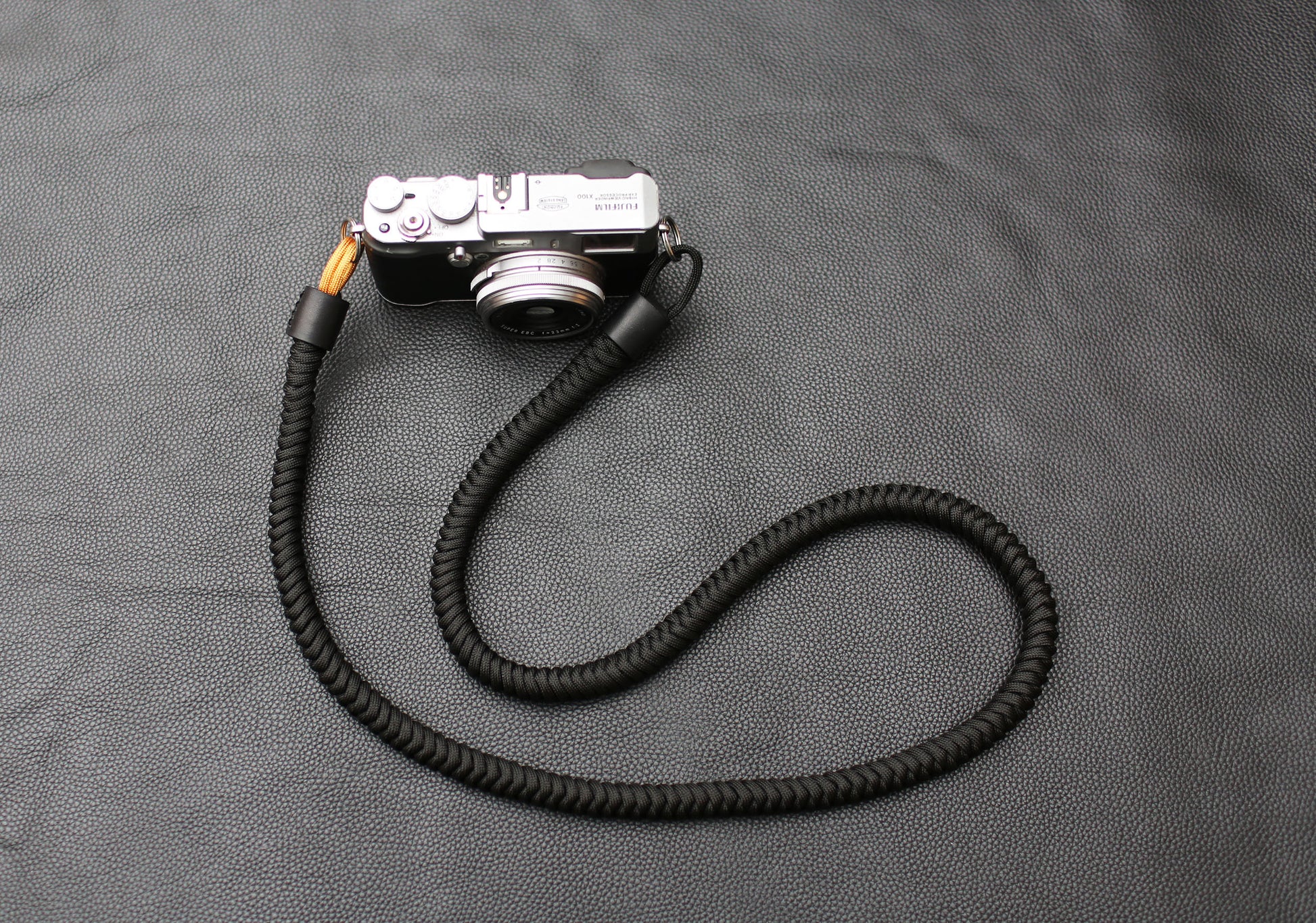 Paracord camera strap showing smooth weave texture
