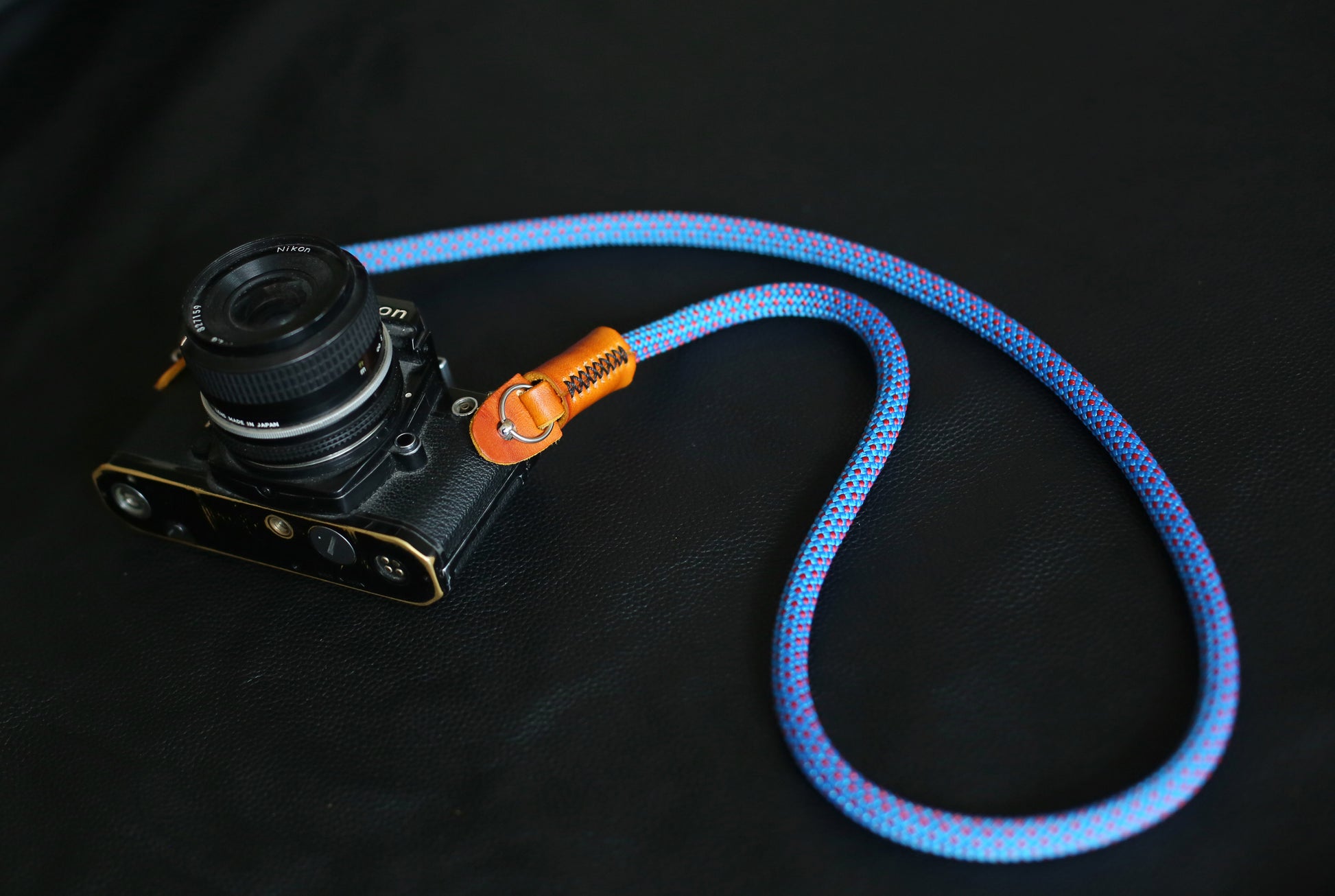rope strap attached to vintage camera
