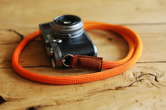 bright orange camera neck strap