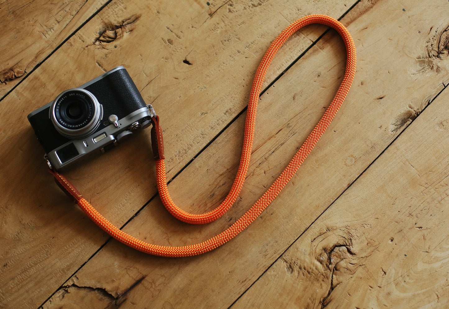 brown leather ends on rope camera strap