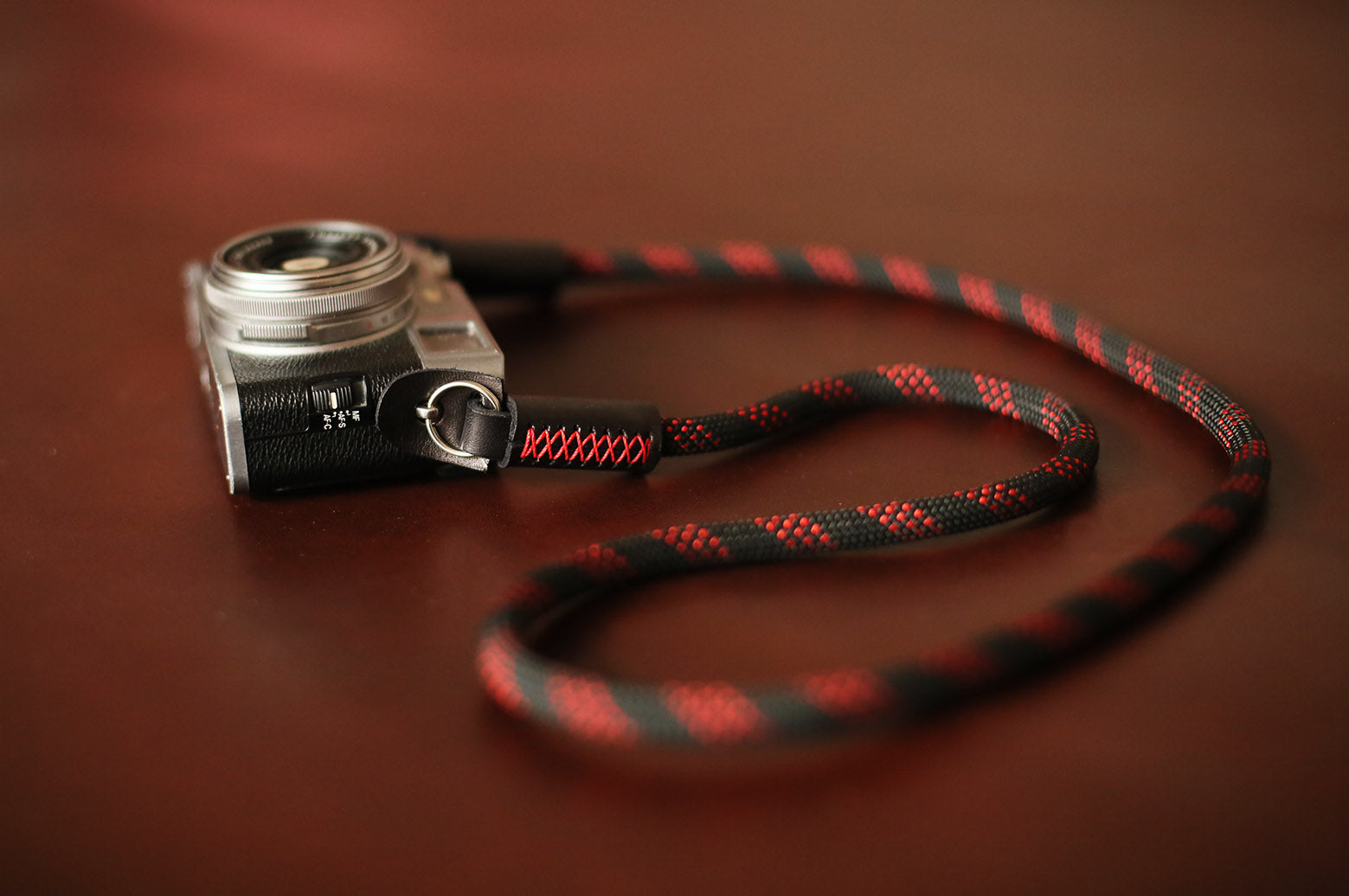 Close-up of leather connector and wax thread detail