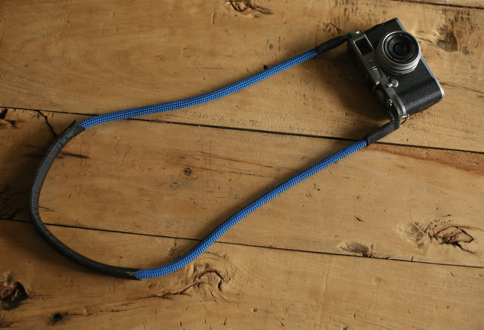 Rope camera strap with metal rings and leather details