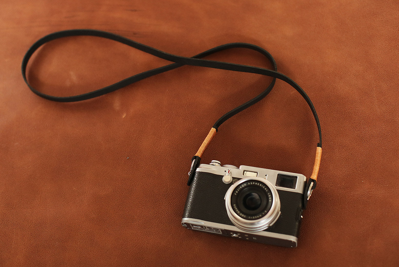 close-up of tan thread on nubuck leather strap