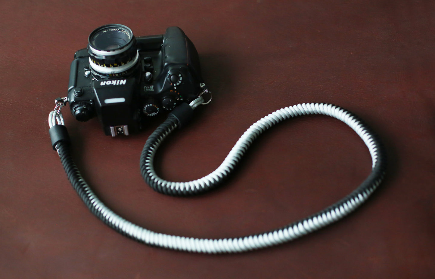Black and silver braided camera strap for Nikon F4 DSLR film cameras