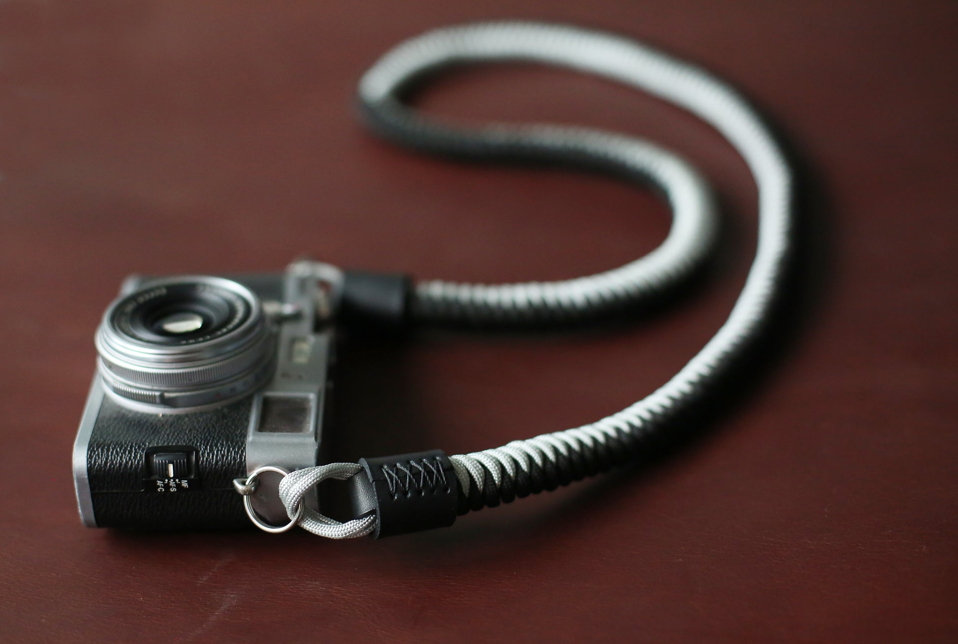 Black and silver handmade camera sling strap for heavy cameras