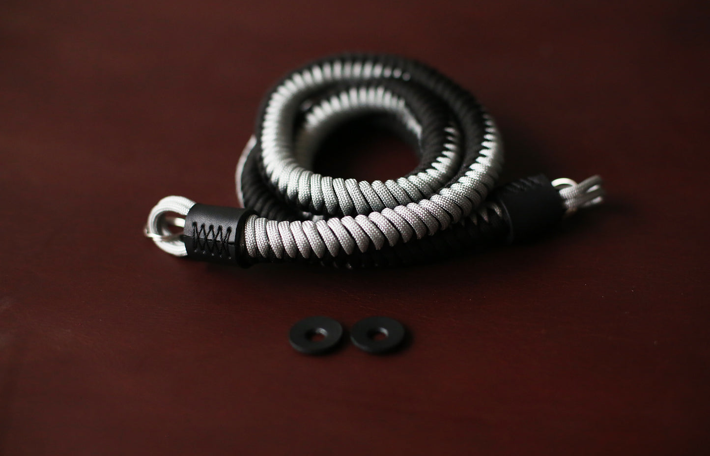Black and silver woven camera strap for travel and street photography