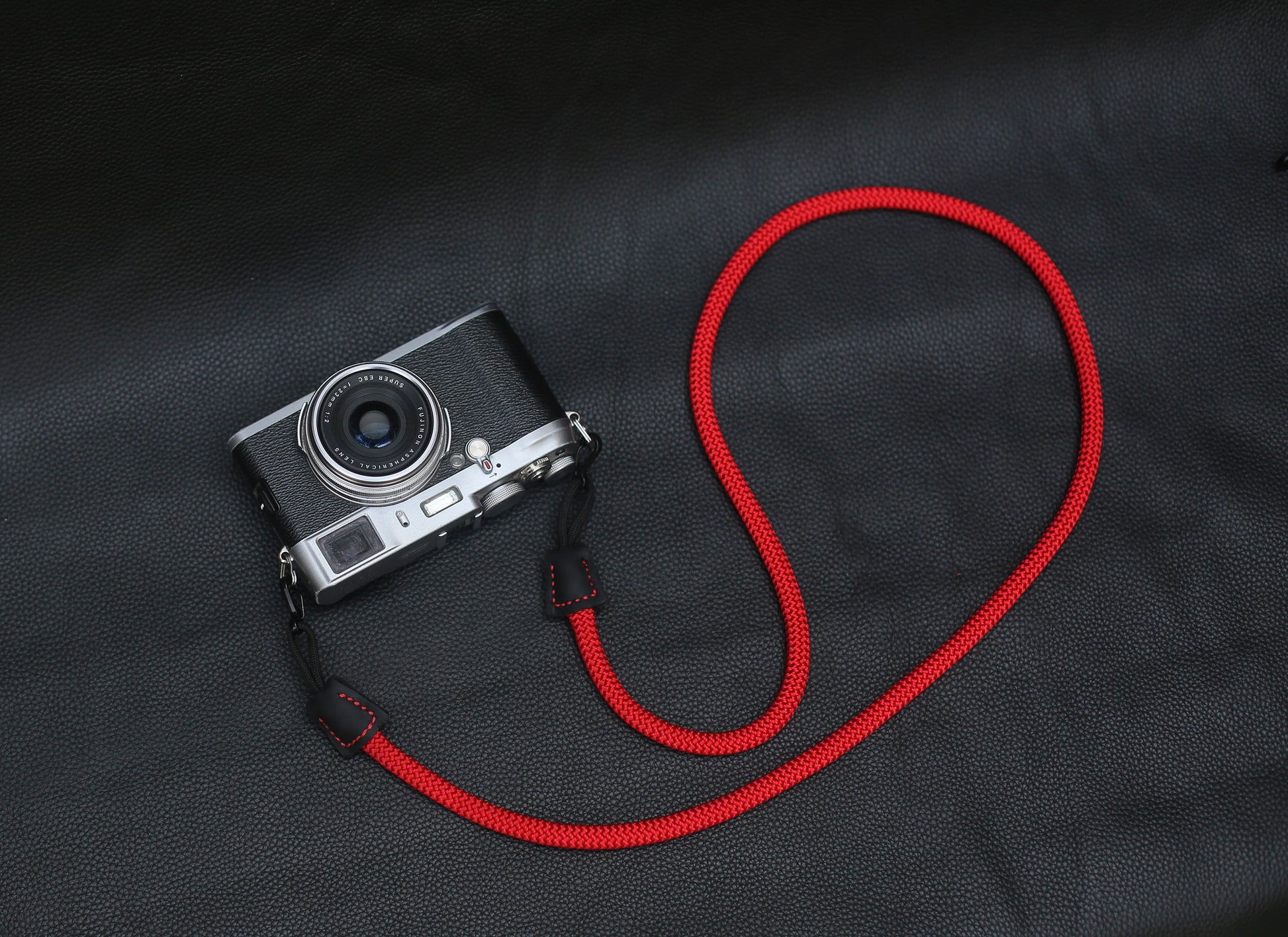 Handmade red climbing rope strap for mirrorless, SLR, and film cameras