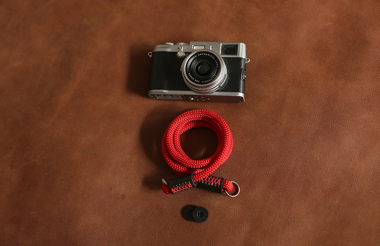 Closeup of red stitching and black leather ends on 8mm rope strap