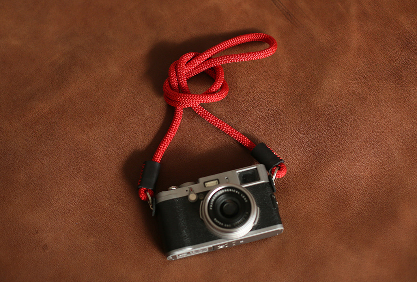 Texture shot showing tight weave of red climbing-rope strap