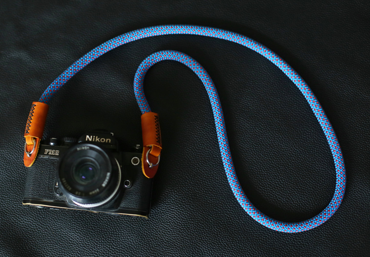 hand stitched leather ends on camera strap