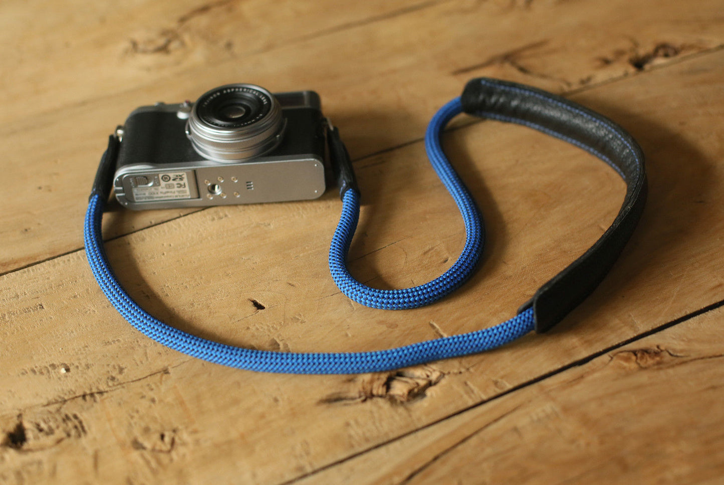Handmade blue camera strap with pressure-relief pad